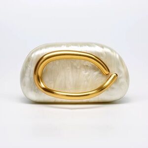 Beige and gold clutch